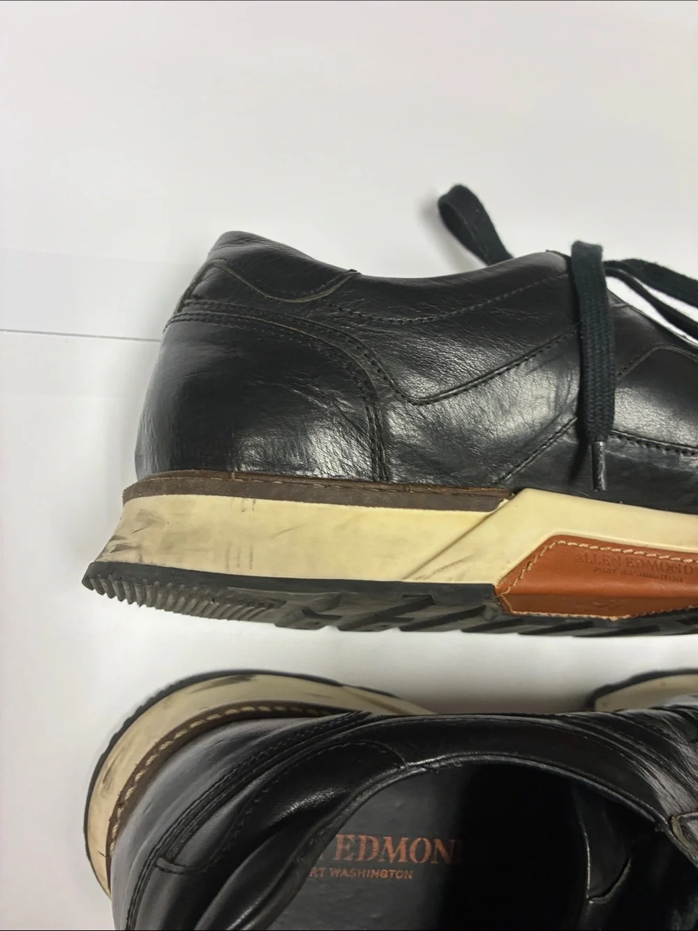 Allen Edmonds Black Leather Low-Top Sneakers with Cream Trim
